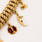 Bracelet Bracelet breloques or jaune et émail 58 Facettes DDV9410-1