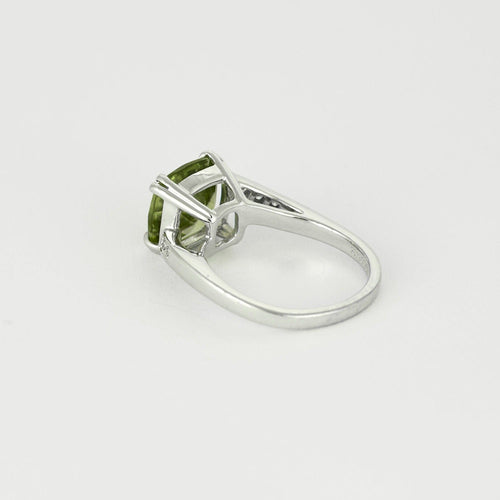 Bague 48.5 MAUBOUSSIN - "Mom je t'aime" - Bague or blanc, péridot et diamants 58 Facettes DV0812-3-485-2