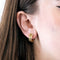 Boucles d'oreilles CARTIER- Boucles d'oreilles "C", trois ors 58 Facettes DV0839-2