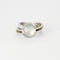GUY LAROCHE - Bague croisée or blanc, aigue marine et pierres semi-préciseuses