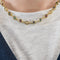 Collier Collier or jaune, saphir, émeraudes et rubis 58 Facettes DV10645-21