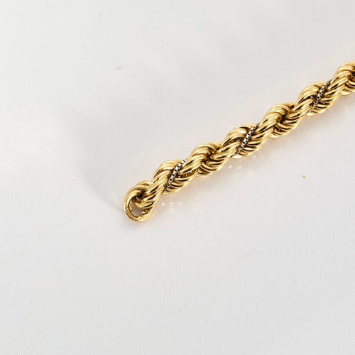 Bracelet Bracelet torsadé en or jaune et diamants 58 Facettes DV10645-1