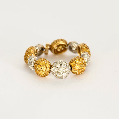 CHANTECLER- Bagues souples en or jaune et or gris, diamants et saphirs jaune