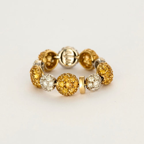 CHANTECLER- Bagues souples en or jaune et or gris, diamants et saphirs jaune