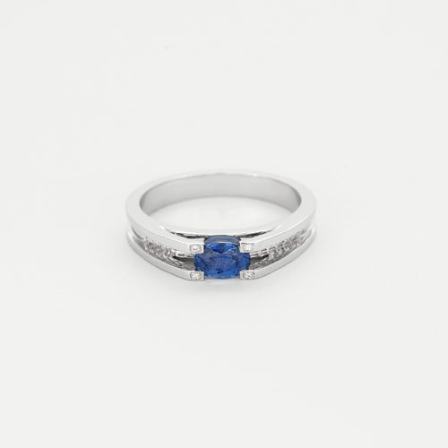 Bague en or gris saphir et diamants
