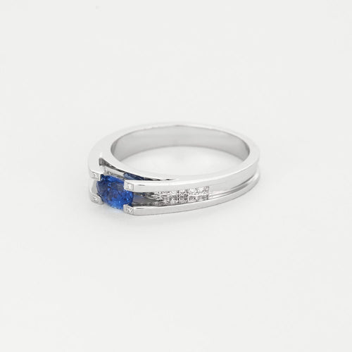 Bague en or gris saphir et diamants