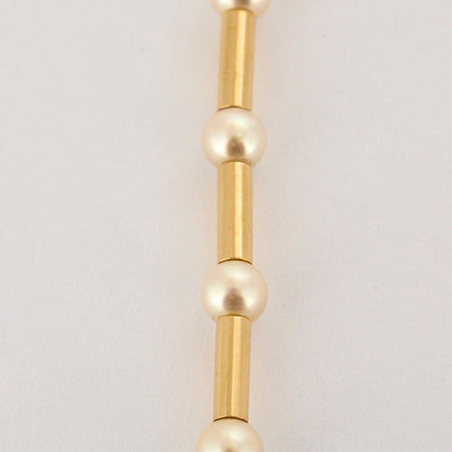 Collier POIRAY - Fuseau - Collier grans modèle en or jaune et perles de culture 58 Facettes DV0834-6