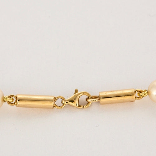 Collier POIRAY - Fuseau - Collier grans modèle en or jaune et perles de culture 58 Facettes DV0834-6