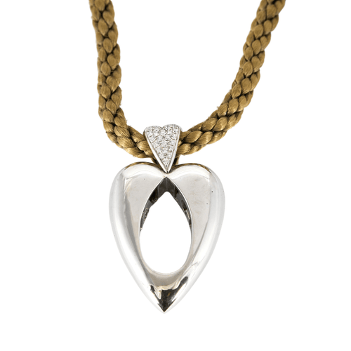 Pendentif Piaget - Pendentif coeur en or gris et diamants 58 Facettes DV13601-1