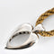 Pendentif Piaget - Pendentif coeur en or gris et diamants 58 Facettes DV13601-1