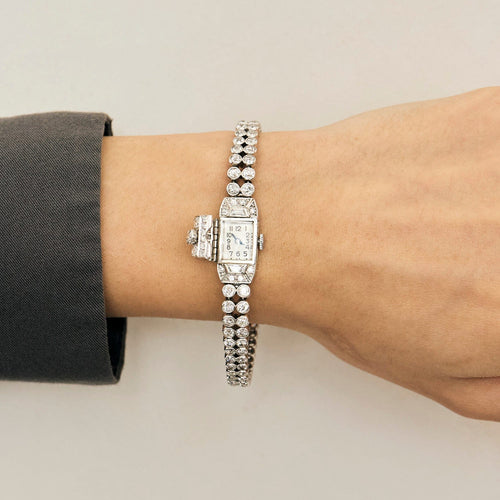 Montre Montre bracelet à secret en or blanc, platine et diamants 58 Facettes DV0872-2