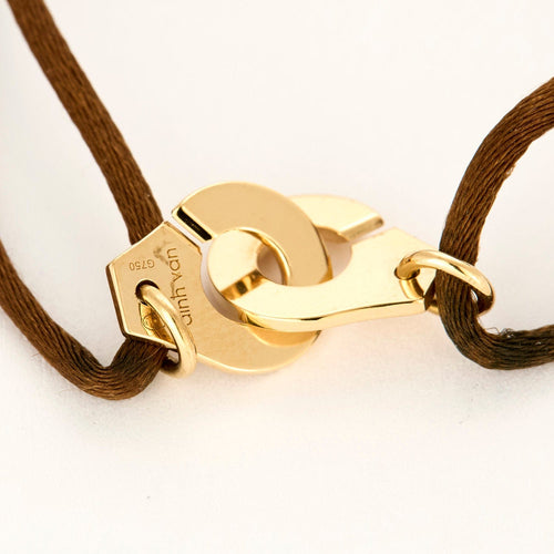 Bracelet DINH VAN - R10 - Bracelet menottes en or jaune et cordon de soie 58 Facettes DV2196-4