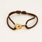 Bracelet DINH VAN - R10 - Bracelet menottes en or jaune et cordon de soie 58 Facettes DV2196-4