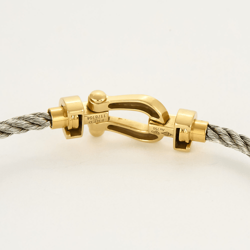 Bracelet FRED - Force 10 - Bracelet en or jaune et cordon en acier 58 Facettes DV17381-7