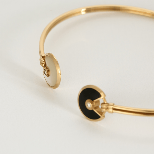 Bracelet CARTIER - Amulette - Bracelet jonc ouvert en or rose, onyx, nacre et diamants 58 Facettes DV18320-2