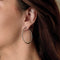 Paire d'anneaux d'oreilles en or blanc et diamants 58 Facettes DV17385-4