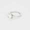 Bague solitaire en or gris et diamants