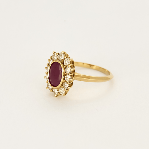 Bague marguerite en or jaune , rubis et diamants