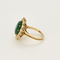 Importante Bague marguerite en or jaune émeraude et diamants