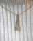 Pendentif Pendentif Art Déco en or jaune et platine, pavé de diamants 58 Facettes A10216-B