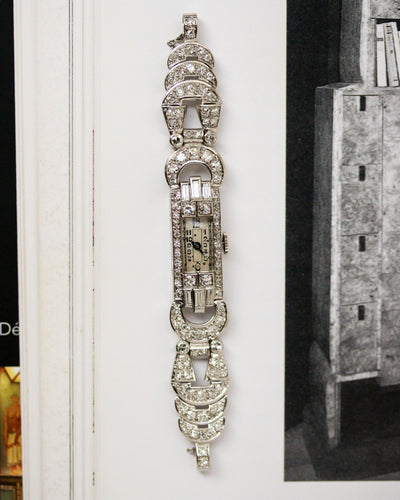 Montre Montre Art Déco en platine pavée de diamants 58 Facettes A10571