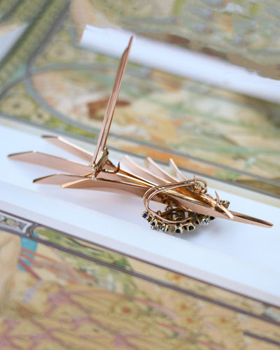 Broche Broche motif feuilles 1950 en or rose, saphirs et diamants 58 Facettes A11347