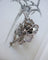 Broche Broche rose pavée de diamants en or blanc et platine 58 Facettes A11364