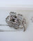 Broche Broche rose pavée de diamants en or blanc et platine 58 Facettes A11364