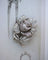 Broche Broche rose pavée de diamants en or blanc et platine 58 Facettes A11364