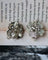 Boucles d'oreilles Boucles d’oreilles fleurs pavées en or blanc et diamants 58 Facettes A11460