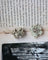 Boucles d'oreilles Boucles d’oreilles fleurs pavées en or blanc et diamants 58 Facettes A11460