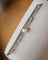 Broche Broche barrette nœud en or rose et or blanc, perle et diamants 58 Facettes A11494