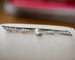 Broche Broche barrette nœud en or rose et or blanc, perle et diamants 58 Facettes A11494