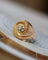 Bague 49 Bague tourbillon 1950 en or rose et diamant 58 Facettes A11907