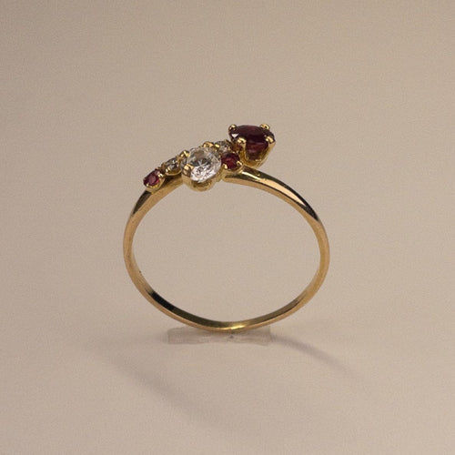 Bague 53 Bague rubis et diamants 0,04 ct en or jaune 18 carats 58 Facettes 250225