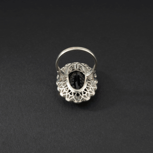 Bague 51 Bague marguerite sertie d’un saphir ovale en platine et diamants 58 Facettes