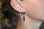 Boucles d'oreilles Boucles d’oreilles dormeuses fleur en or jaune et jais 58 Facettes 3762
