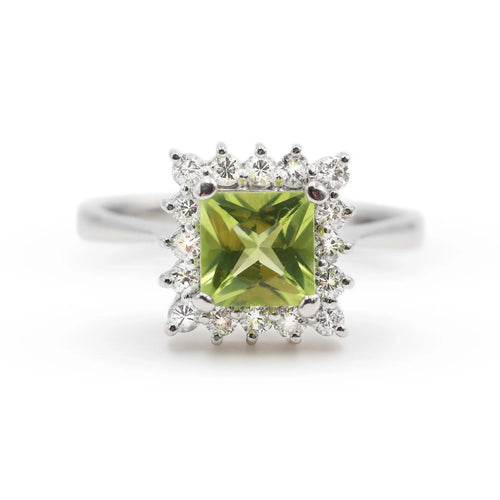 Bague Bague en or blanc 14 ct avec péridot et diamants 58 Facettes 17974