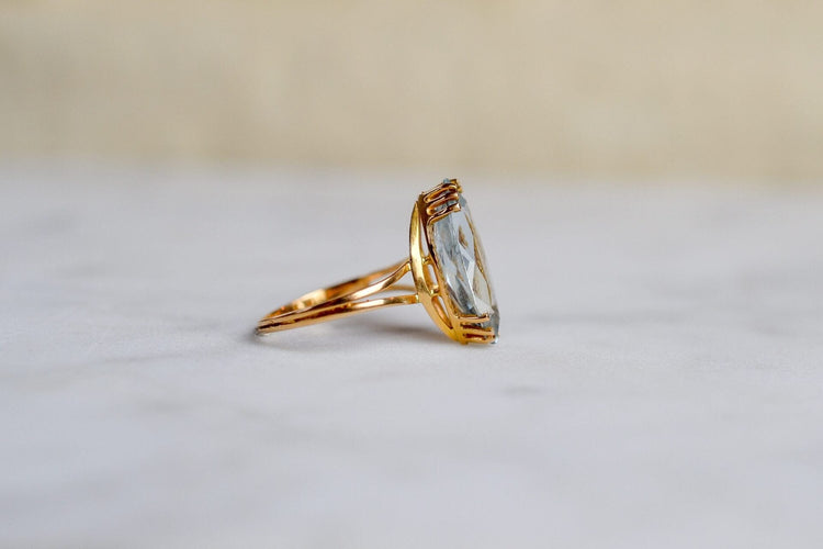 Bague 53 Bague navette vintage en or jaune 18k et aigue-marine 58 Facettes 3732