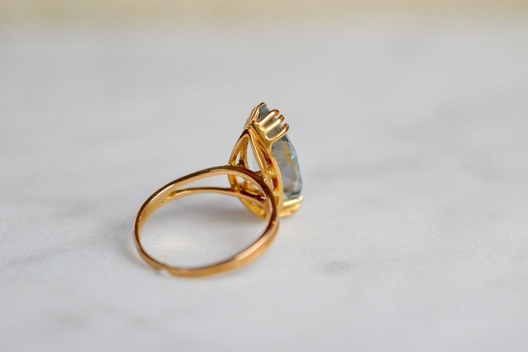 Bague 53 Bague navette vintage en or jaune 18k et aigue-marine 58 Facettes 3732