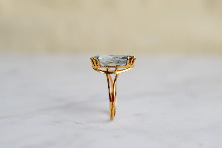 Bague 53 Bague navette vintage en or jaune 18k et aigue-marine 58 Facettes 3732