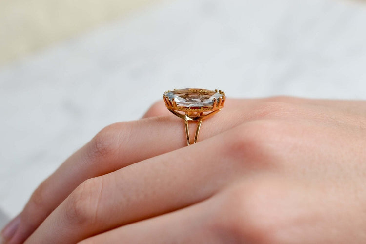 Bague 53 Bague navette vintage en or jaune 18k et aigue-marine 58 Facettes 3732