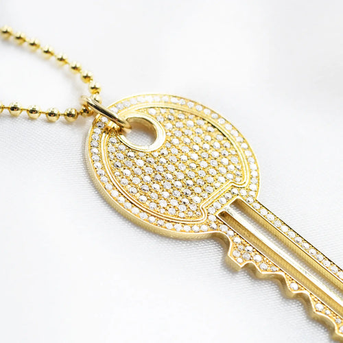 Collier Collier avec pendentif clé en or jaune 18 ct et diamants 58 Facettes 18134