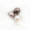 Bague Bague en or blanc 18 kt avec perles et diamants 58 Facettes 5505