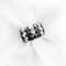 Bague Bague Enigma en or et acier 58 Facettes 8611