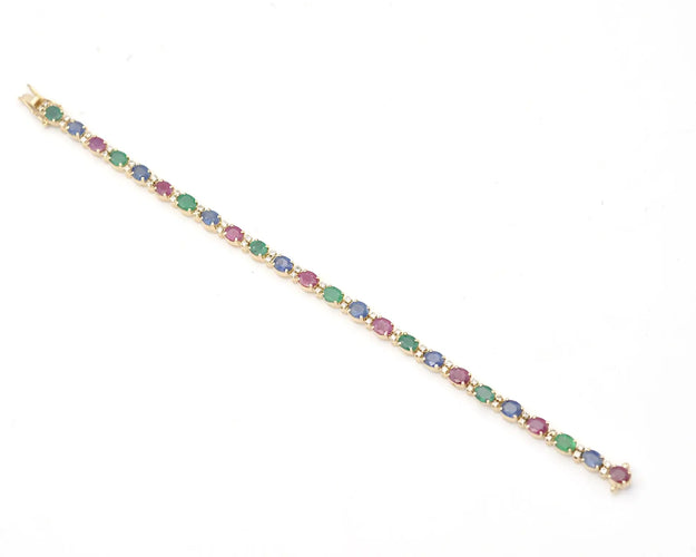 Bracelet Bracelet en or jaune 18 ct avec émeraudes, rubis, saphirs et diamants 58 Facettes 14595