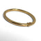Bracelet Bracelet jonc ouvrant grand modèle en or jaune 18k 58 Facettes