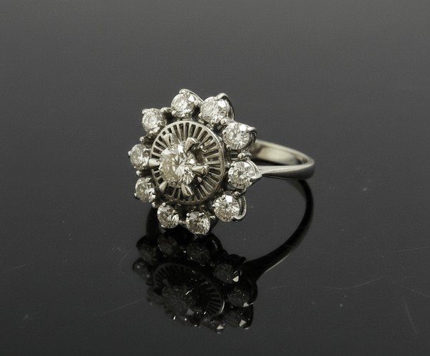 Bague Bague en or blanc avec diamants, période littoria italienne 58 Facettes