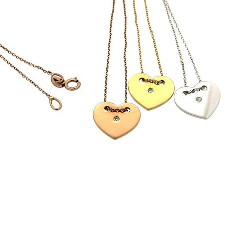 Collier Collier ras-du-cou avec pendentif cœur et diamant en or blanc 58 Facettes G1629