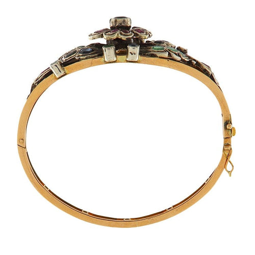 https://www.gioielleriaguidetti.it/wp-content/uploads/2025/08/G3815-Bracciale-floreale-zaffiri-rubini-smer_2.jpg